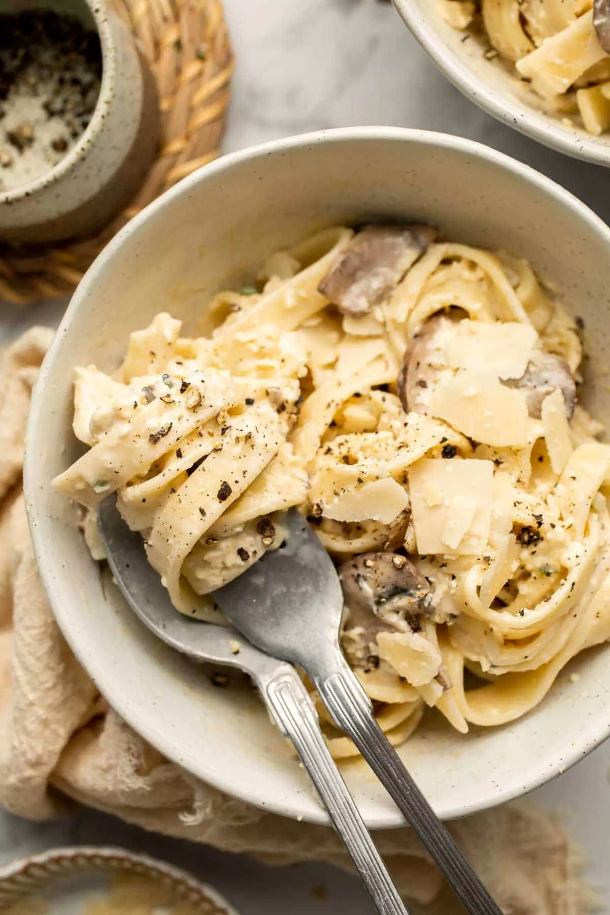 Creamy Mushroom Tagliatelle Pasta is a quick and easy, restaurant-worthy vegetarian dinner that is ready in just 30 minutes! Elevated comfort food at home.