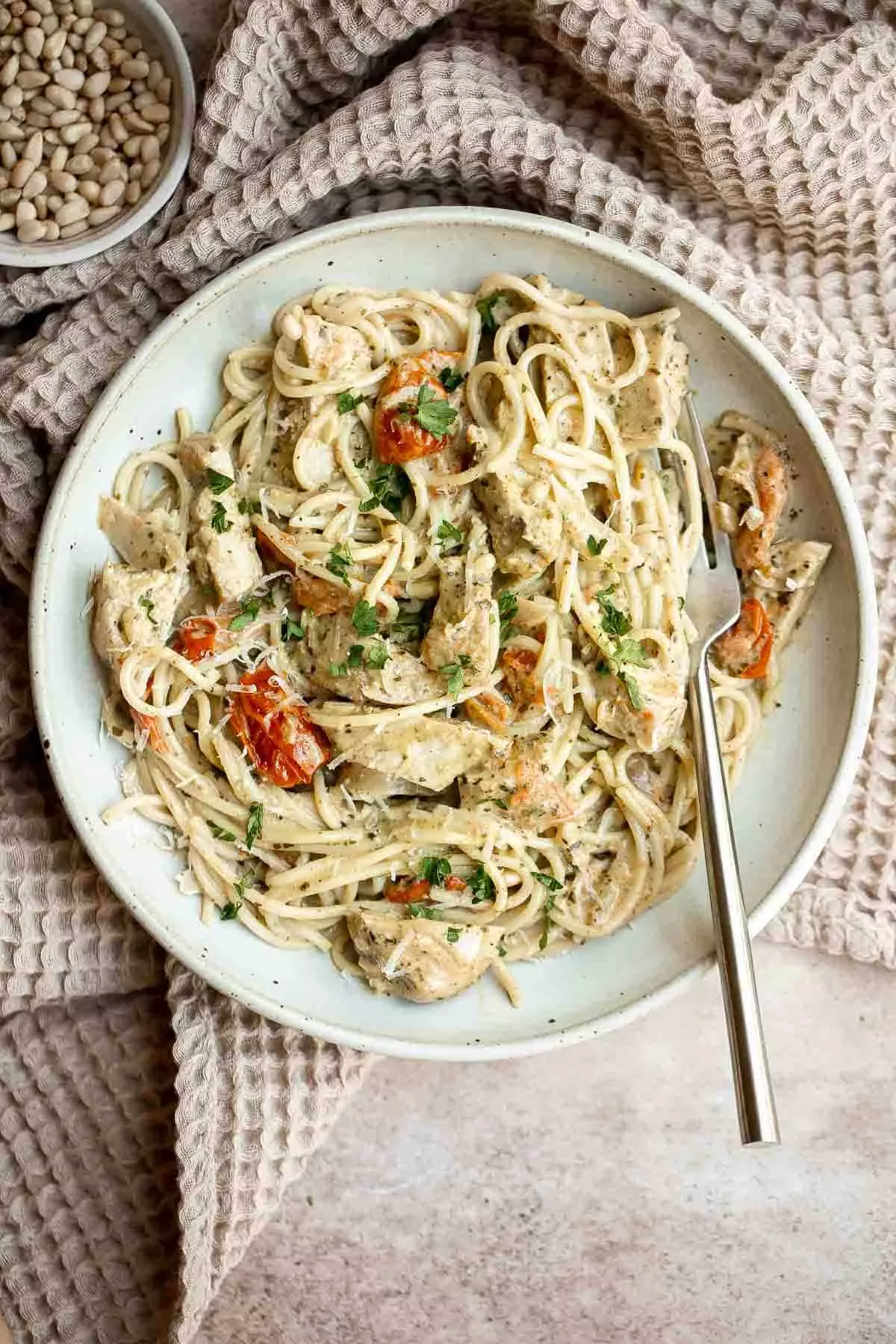 Creamy Chicken Pesto Pasta is a delicious 30 minute recipe that is packed with flavor, quick and easy to make, and will satisfy the whole family.