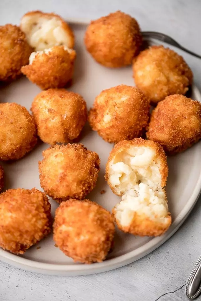 Fried mac and cheese balls are crispy on the outside, creamy and cheesy on the inside, and have the perfect crunch. Best way to use leftover mac and cheese.