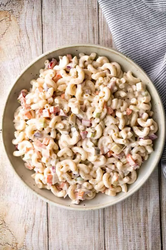 Classic macaroni salad is a creamy and delicious pasta salad that is easy to throw together. It