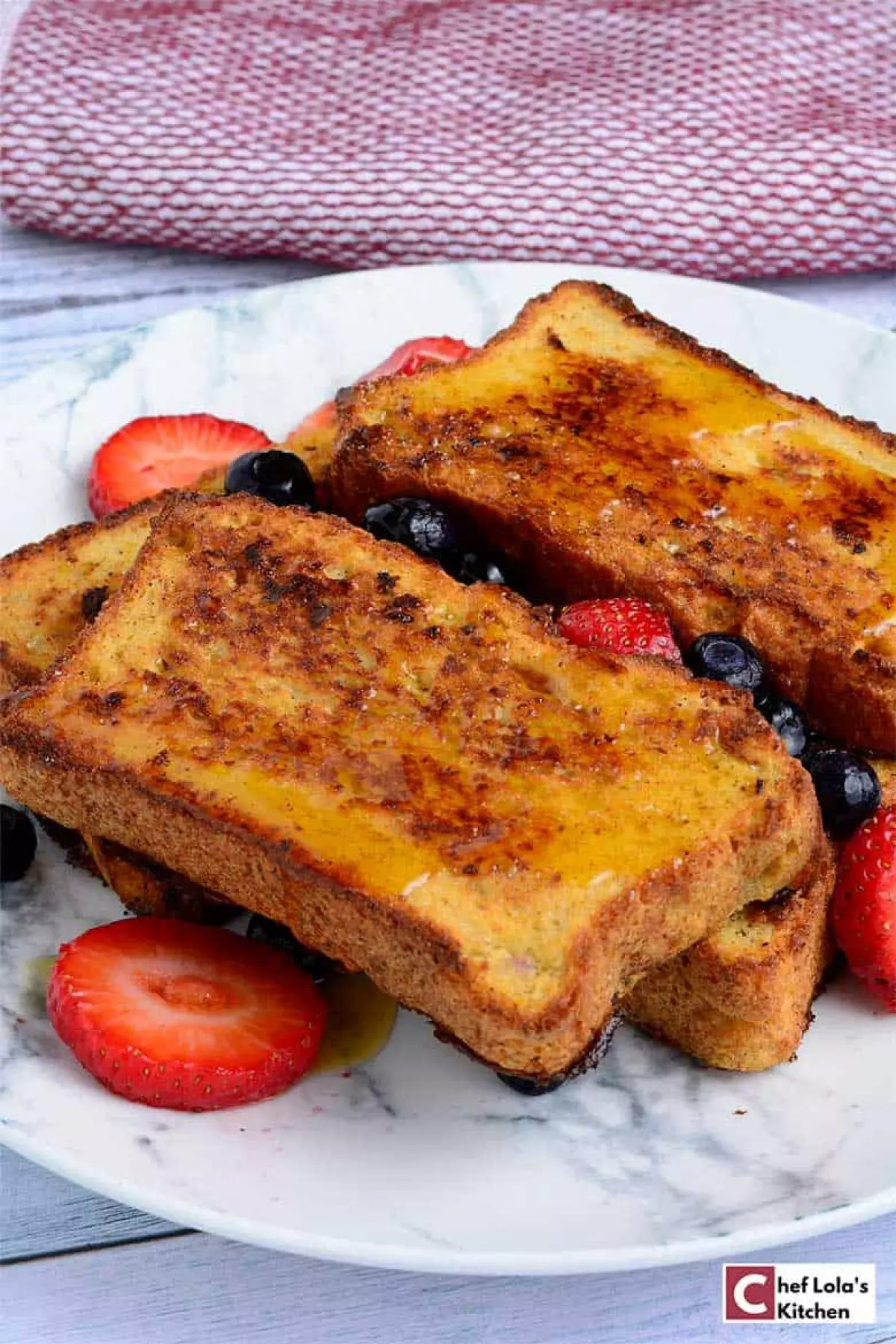 Oven baked french toast garnished with berries