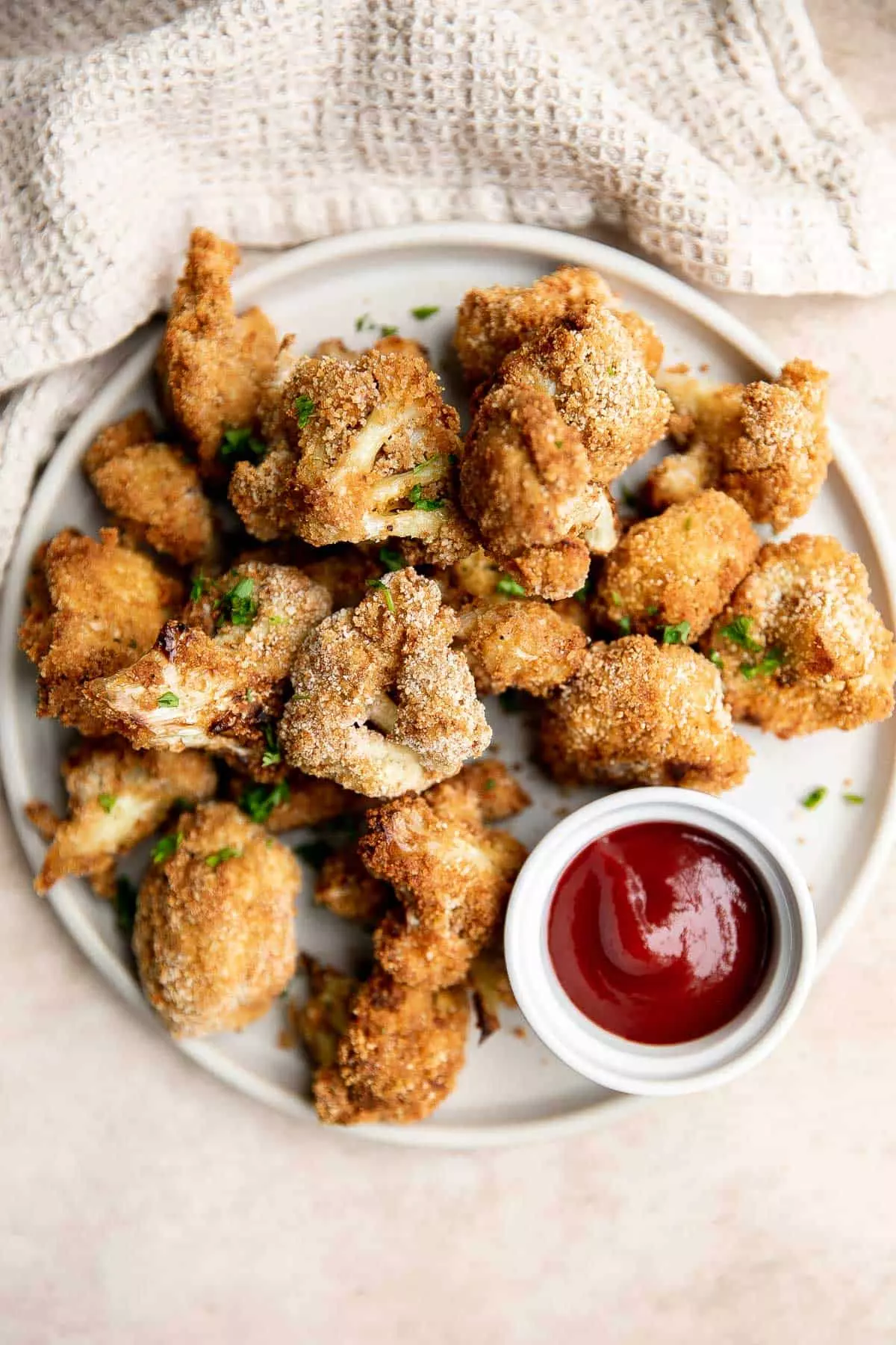 Air fryer cauliflower bites have a crispy breaded coating outside, yet tender and light inside. They are bite-sized, flavorful, easy to make, and healthy.