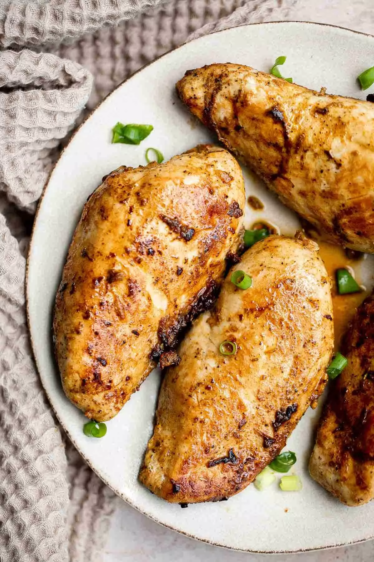 Mexican chicken breast is juicy, tender, and flavorful. It's easy to prep with a quick marinade before cooking on the stove, air fryer, or oven.