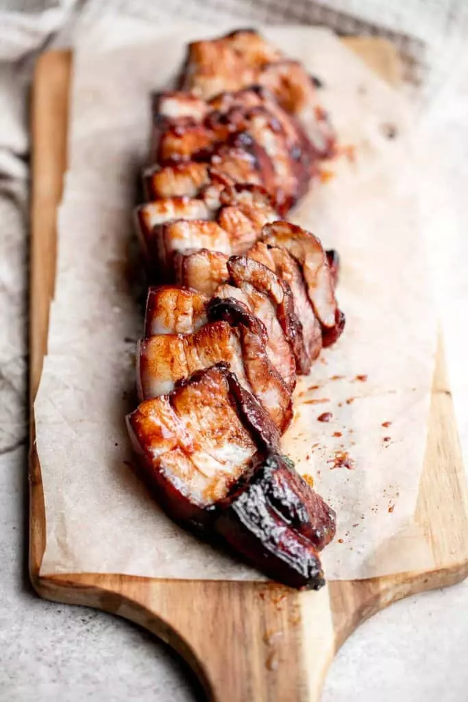 Char siu (Chinese BBQ pork) is a delicious, flavorful, traditional roasted pork dinner slathered in a distinct sticky, sweet, savory barbecue sauce glaze.