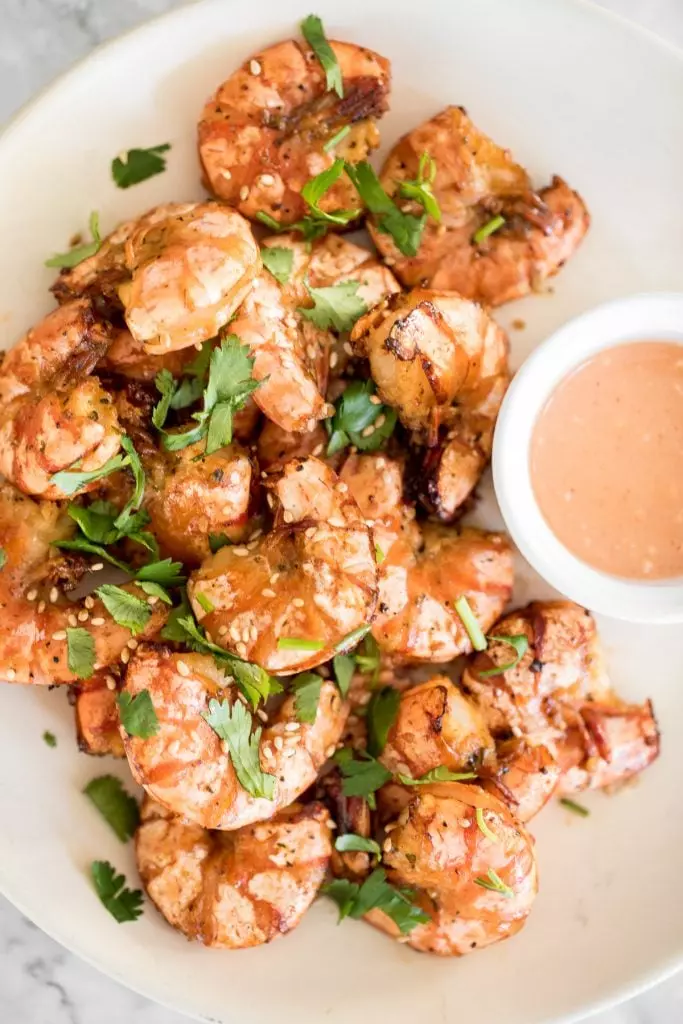 10-minute air fryer jumbo shrimp is juicy and tender on the inside, and crispy on the outside. It's so flavorful and garlicky with Asian seasonings.