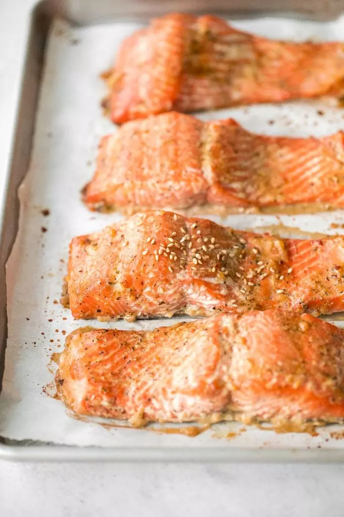 Quick and easy baked maple salmon is so delicious, flaky, and flavorful with the perfect balance between sweet and savory. The best weeknight dinner.